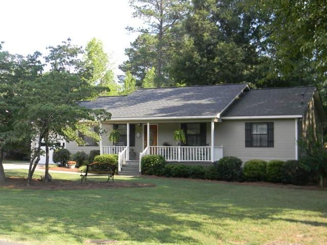 6 Dekle Drive Northeast Rome, GA 30161 - Photo 1 of 1 a view of a house with a garden