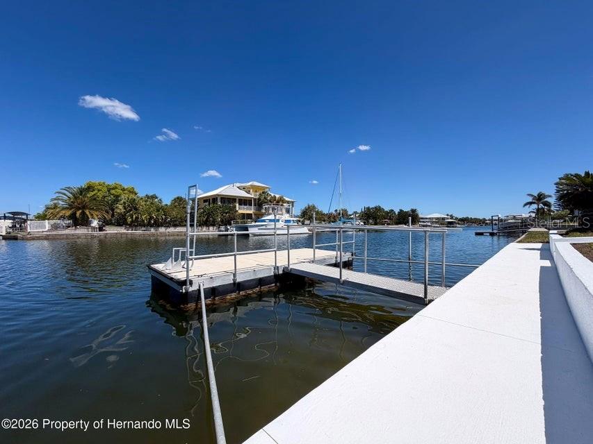 3473 Gulf Coast Drive Hernando Beach, FL 34607 - Photo 11 of 50 a view of a lake with couches