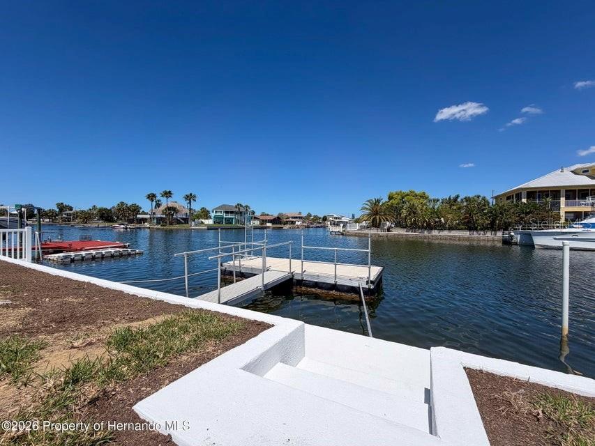 3473 Gulf Coast Drive Hernando Beach, FL 34607 - Photo 13 of 50 a view of a lake with a terrace