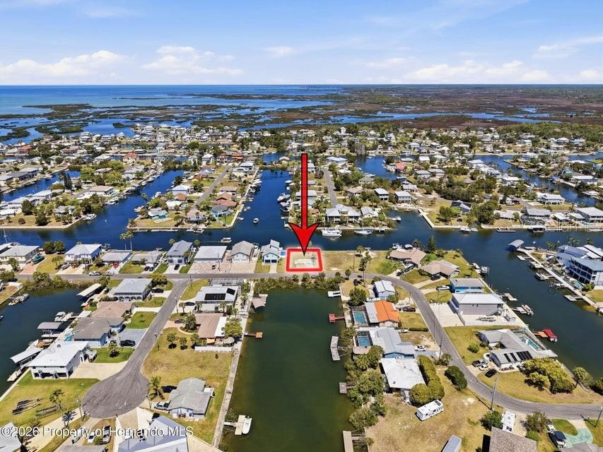 3473 Gulf Coast Drive Hernando Beach, FL 34607 - Photo 19 of 50 an aerial view of residential houses with outdoor space