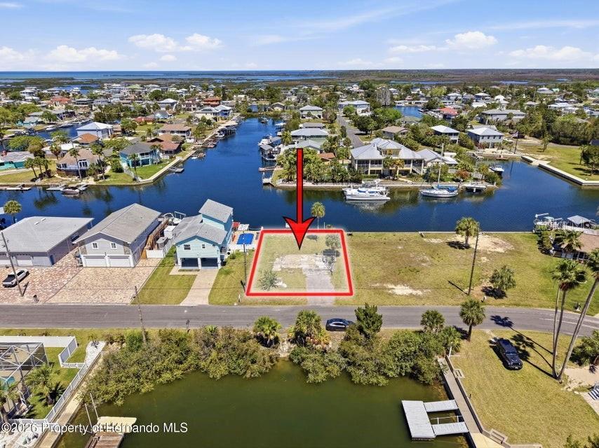 3473 Gulf Coast Drive Hernando Beach, FL 34607 - Photo 2 of 50 an aerial view of residential houses with outdoor space