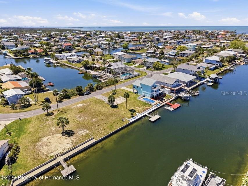 3473 Gulf Coast Drive Hernando Beach, FL 34607 - Photo 22 of 50 an aerial view of residential houses with outdoor space