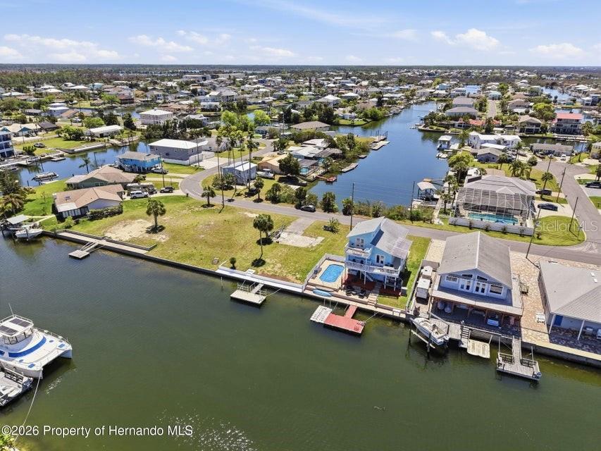 3473 Gulf Coast Drive Hernando Beach, FL 34607 - Photo 26 of 50 an aerial view of residential houses with outdoor space