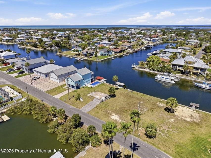 3473 Gulf Coast Drive Hernando Beach, FL 34607 - Photo 30 of 50 an aerial view of residential houses with outdoor space