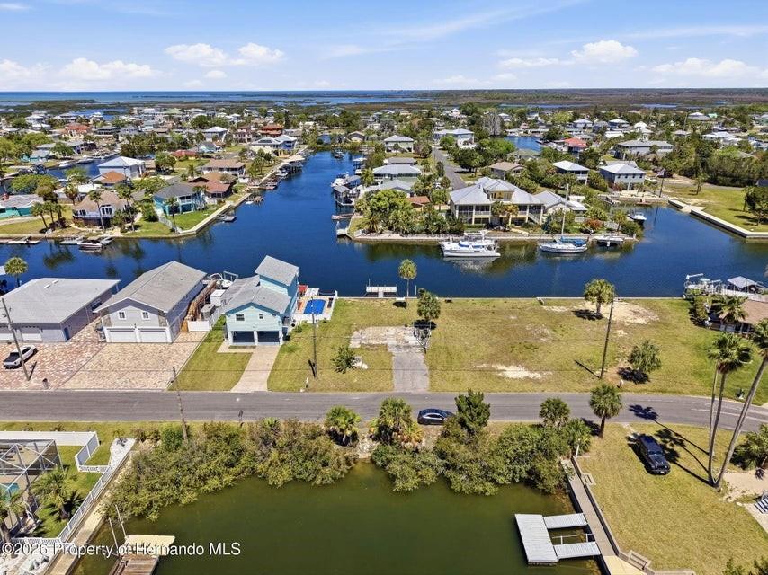3473 Gulf Coast Drive Hernando Beach, FL 34607 - Photo 3 of 50 an aerial view of residential houses with outdoor space