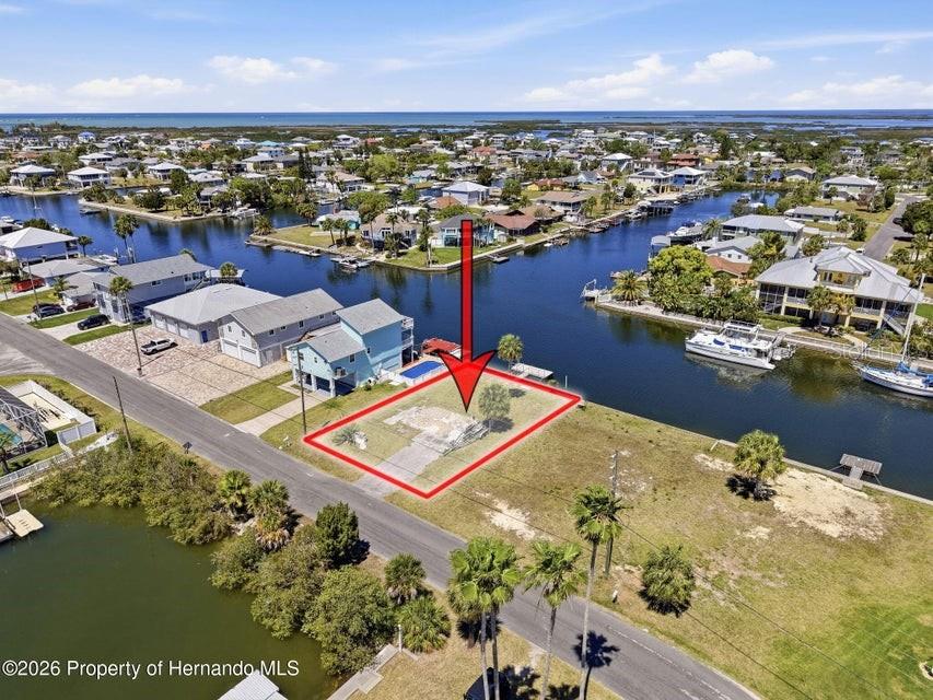 3473 Gulf Coast Drive Hernando Beach, FL 34607 - Photo 31 of 50 an aerial view of residential houses with outdoor space