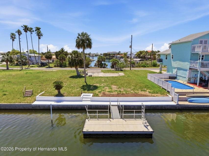 3473 Gulf Coast Drive Hernando Beach, FL 34607 - Photo 43 of 50 a view of a lake with boats in the background
