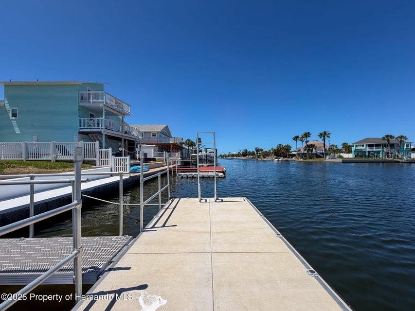 3473 Gulf Coast Drive Hernando Beach, FL 34607 - Photo 8 of 50 a view of a balcony with an ocean view