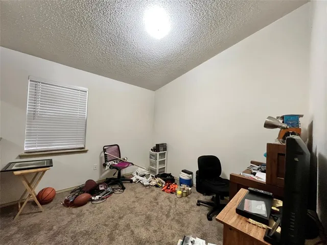 a room with furniture and a window