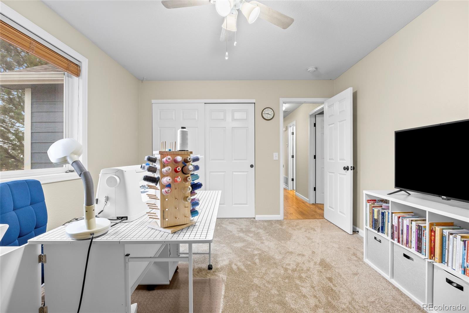 42865 Vista Ridge Road Parker, CO 80138 - Photo 24 of 50 a view of a dining room with furniture and a chandelier