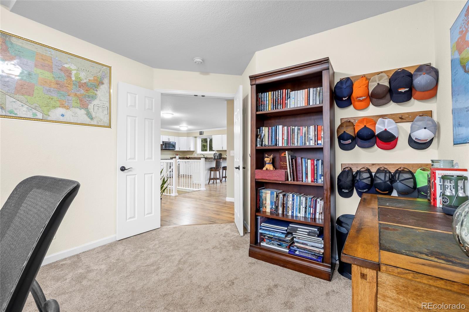 42865 Vista Ridge Road Parker, CO 80138 - Photo 26 of 50 a view of a workspace with furniture and toys
