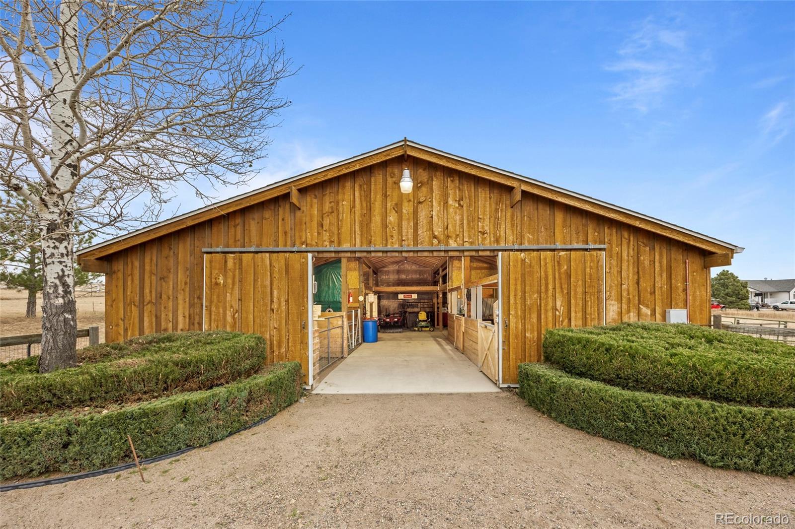 42865 Vista Ridge Road Parker, CO 80138 - Photo 42 of 50 a view of a house with a backyard