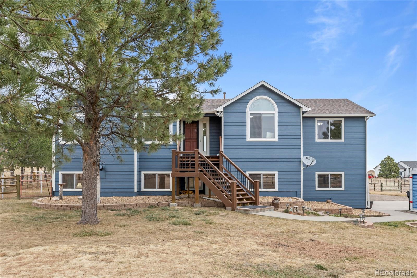42865 Vista Ridge Road Parker, CO 80138 - Photo 5 of 50 a view of a house with a yard
