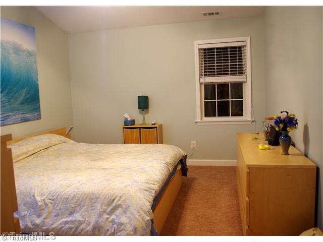 3525 Baxter Road Southeast Winston-Salem, NC 27107 - Photo 12 of 16 Master Bedroom. This Master Bedroom has a cathedral ceiling and a great Walk in Closet and a Private Bath.