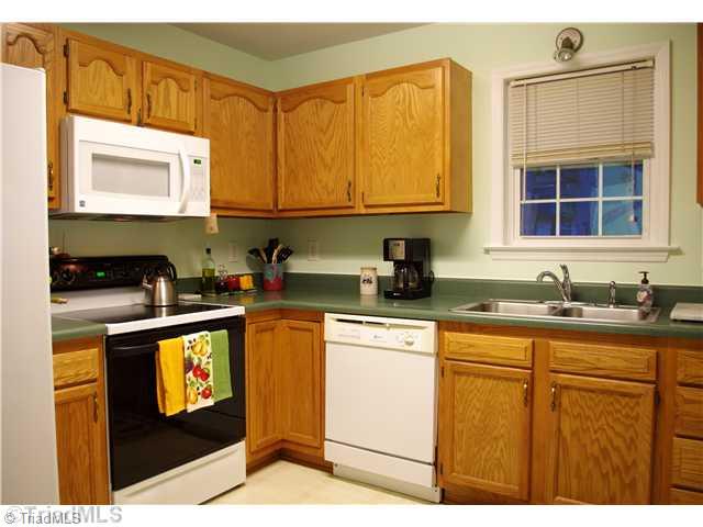 3525 Baxter Road Southeast Winston-Salem, NC 27107 - Photo 10 of 16 Kitchen. It is always nice to have a window in your kitchen to enjoy natures beauty.