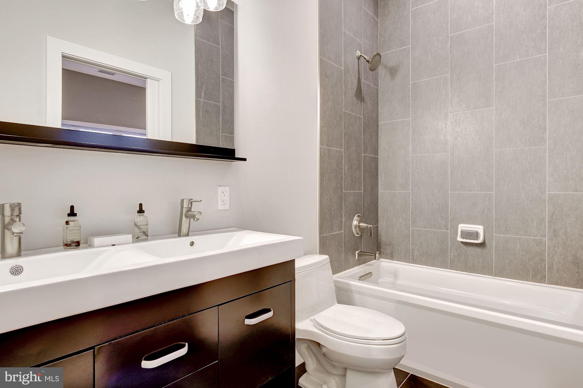 762 Park Road Northwest, Unit 7 Washington, DC 20010 - Photo 12 of 18 Dual Vanities & Tub/Shower Combo