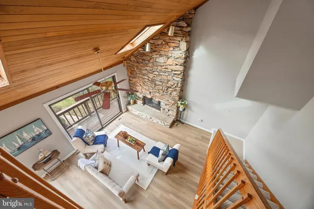 a bedroom with a bed and a large mirror