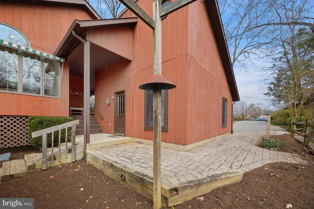 a view of a lake with boats in the background