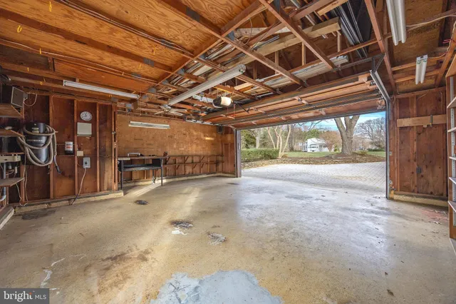 a view of residential houses with outdoor space and lake view