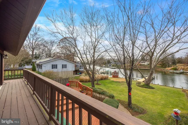 a view of a yard with swimming pool