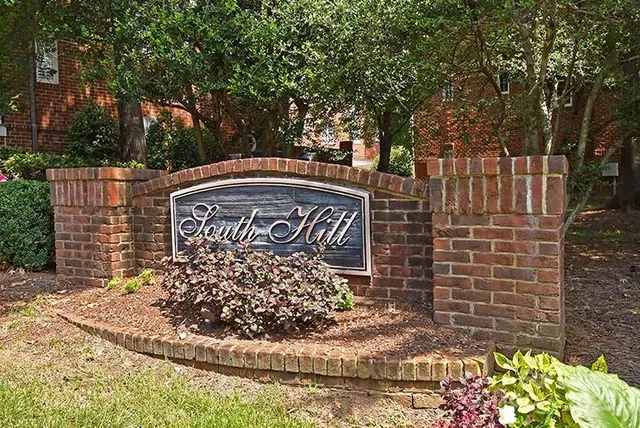 a view of a door with a bench