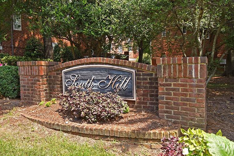 4939 South Hill View Drive Charlotte, NC 28210 - Photo 15 of 24 a view of a door with a bench