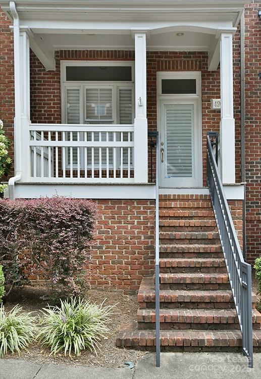 4939 South Hill View Drive Charlotte, NC 28210 - Photo 16 of 24 a front view of a house with a window