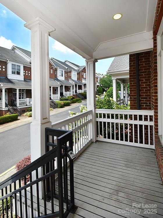 4939 South Hill View Drive Charlotte, NC 28210 - Photo 18 of 24 a view of a balcony with wooden floor