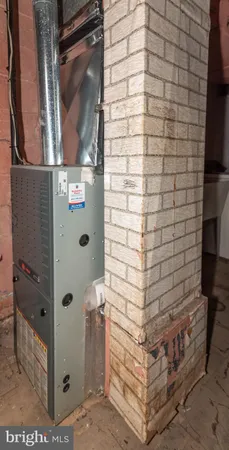 a bathroom with a shower and a sink
