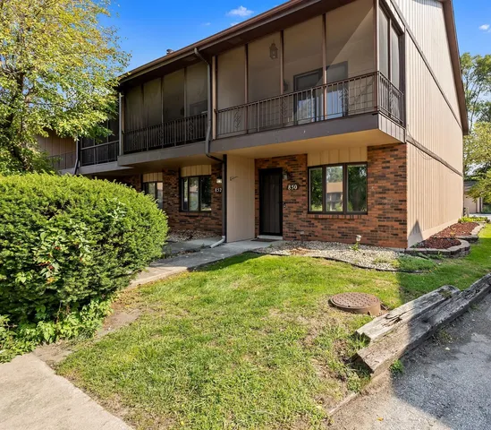 a house with swimming pool in front of it