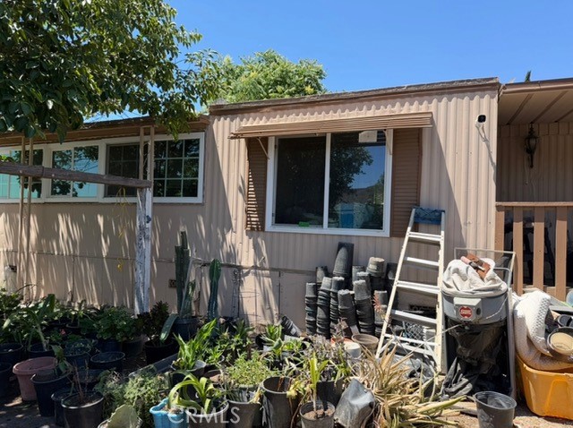 a front view of a house with patio