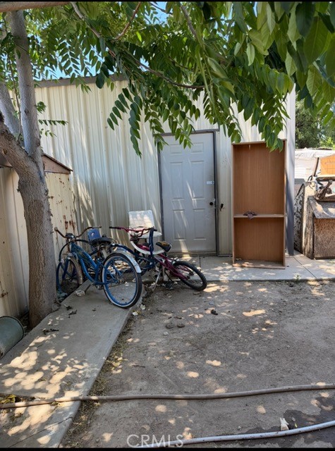 26635 Winchester Road Hemet, CA 92545 - Photo 7 of 10 a view of a garage with a car parked in it