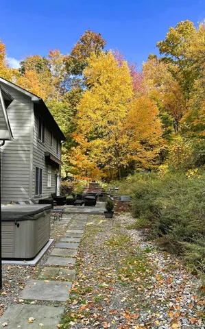 a view of a backyard of the house