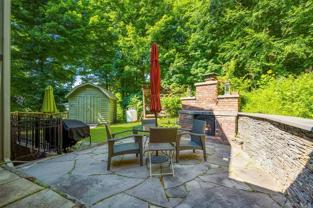 a view of a chairs and table in the patio
