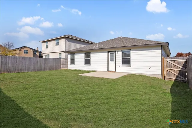 a house view with a garden space