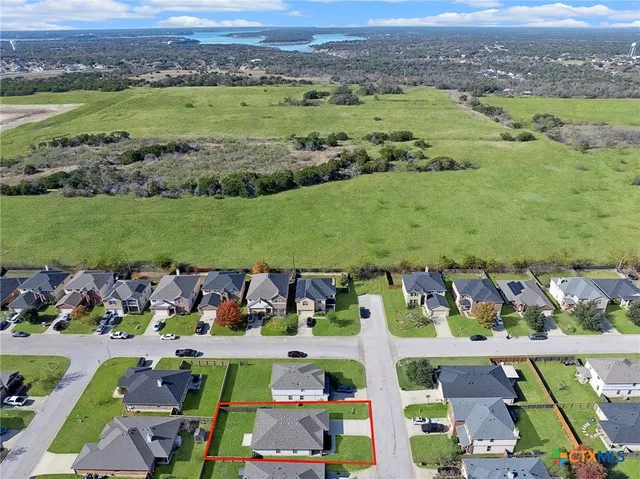 a view of a city with an ocean