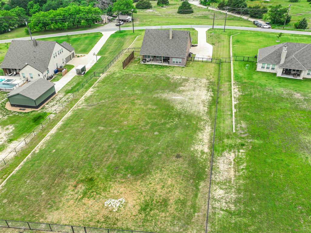 544 Majors Road Van Alstyne, TX 75495 - Photo 33 of 36 a view of a house with a big yard