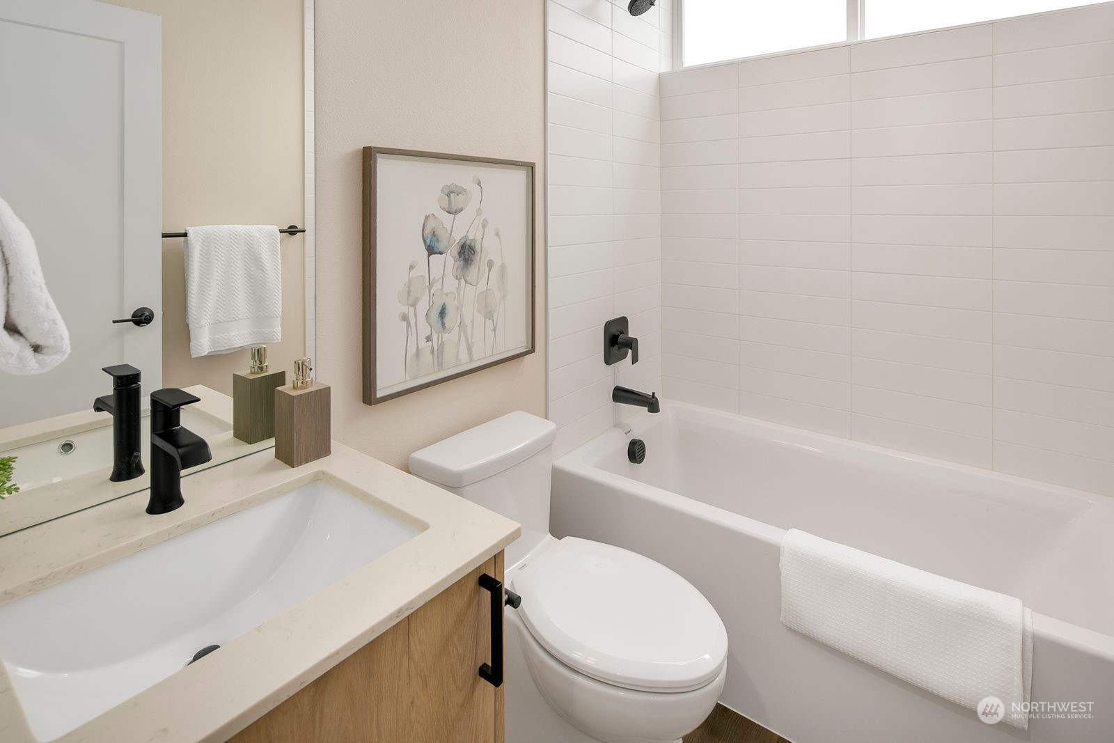 210 16th Avenue South Seattle, WA 98144 - Photo 11 of 17 a bathroom with a toilet a sink and bathtub