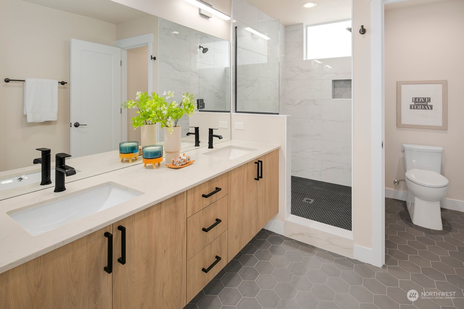 210 16th Avenue South Seattle, WA 98144 - Photo 12 of 17 a bathroom with a sink double vanity and a mirror