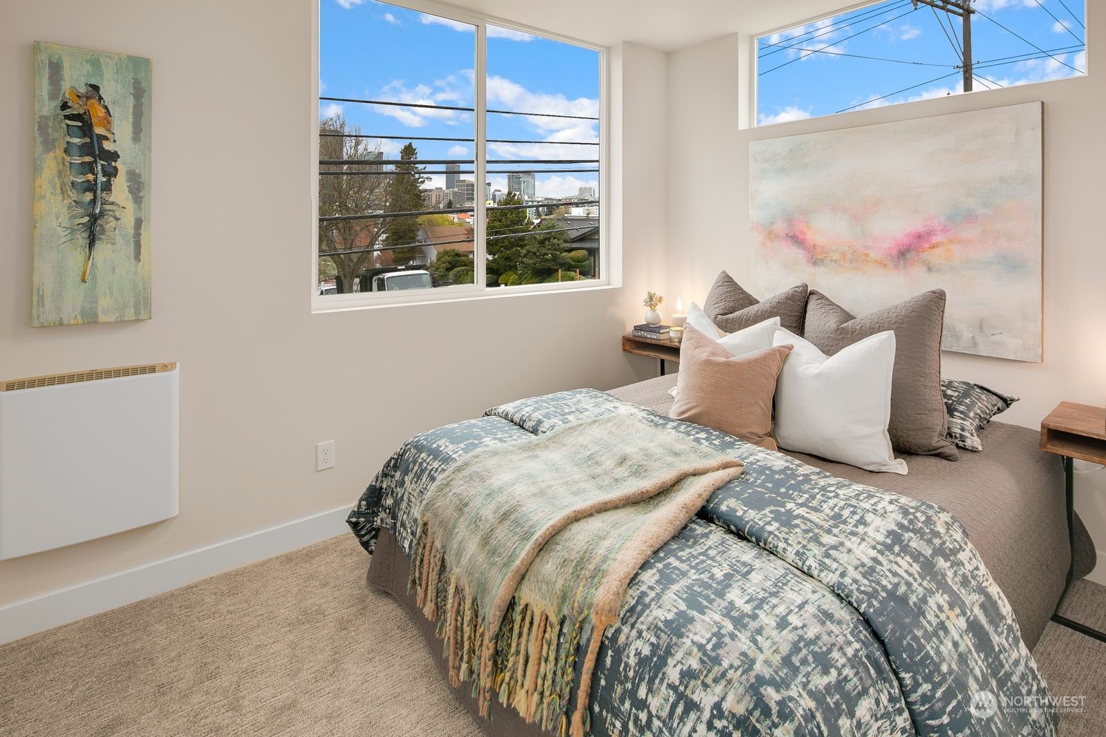 210 16th Avenue South Seattle, WA 98144 - Photo 8 of 17 a bedroom with a bed and window