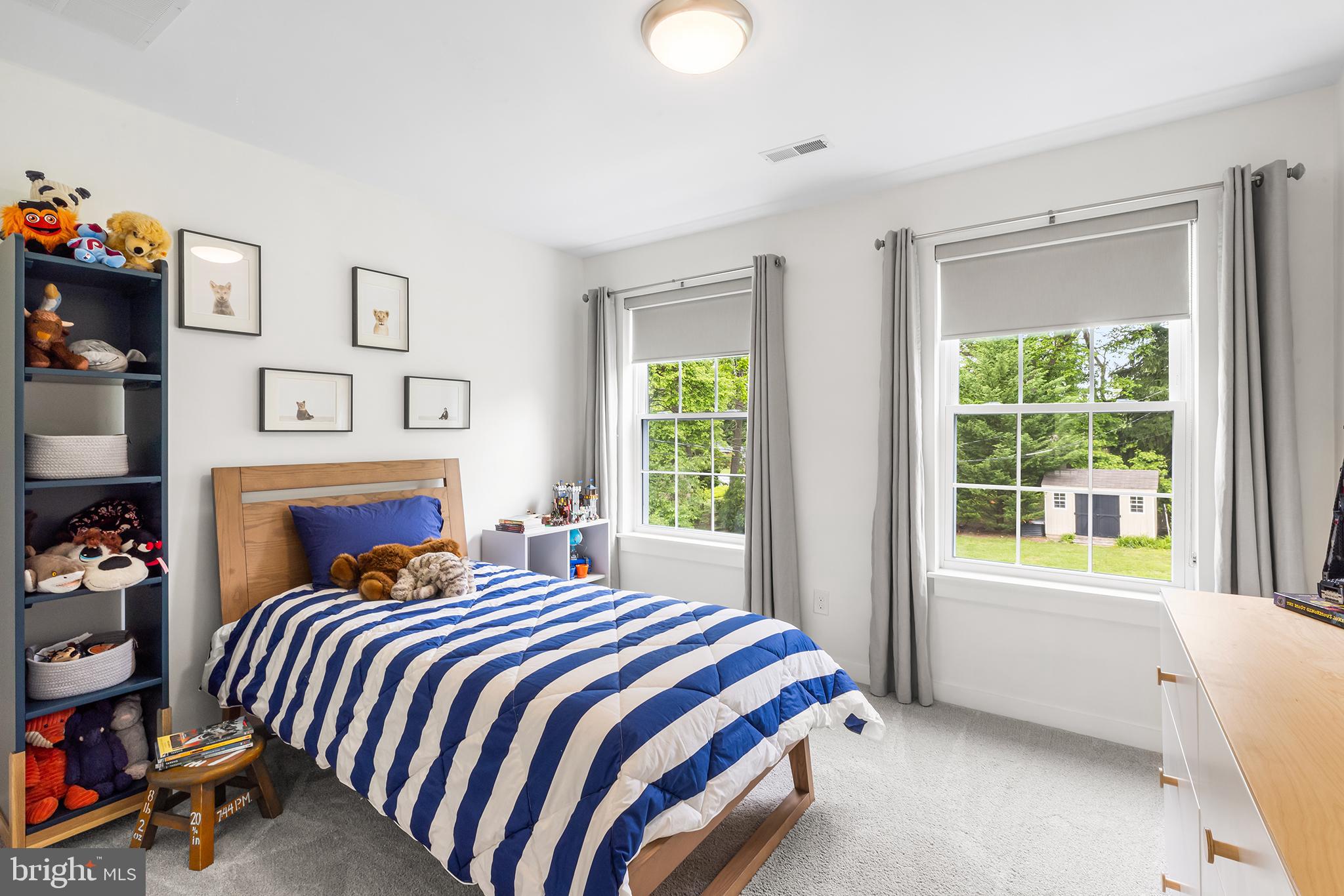 55 Dayleview Road Berwyn, PA 19312 - Photo 27 of 40 a bedroom with a bed and a window