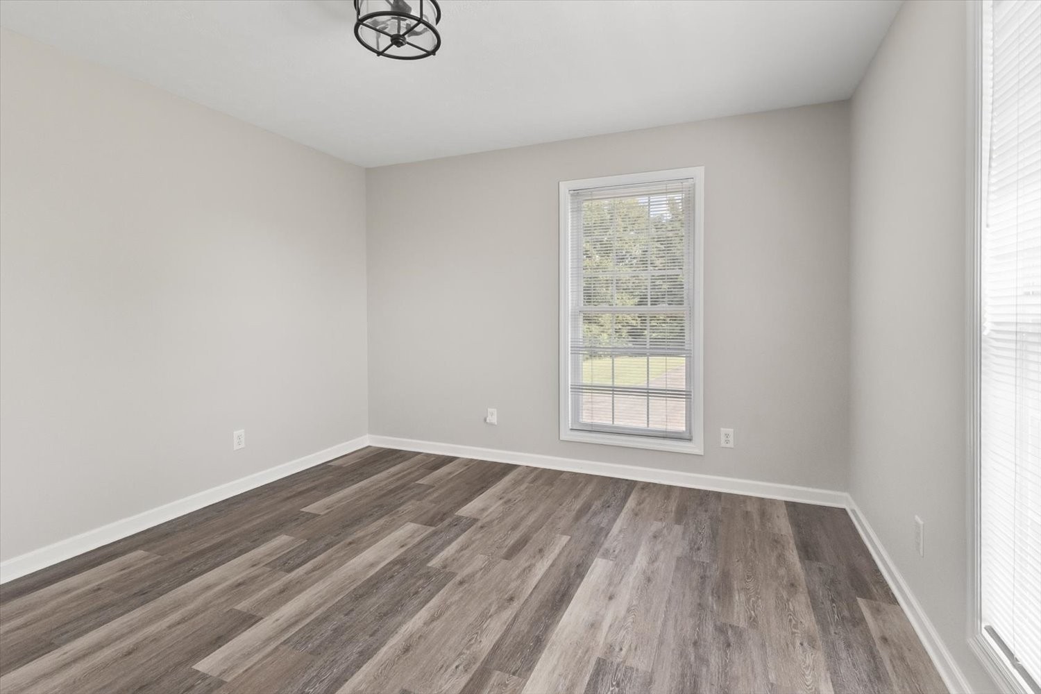 535 Darbytown Road Hohenwald, TN 38462 - Photo 24 of 45 wooden floor in an empty room with a window