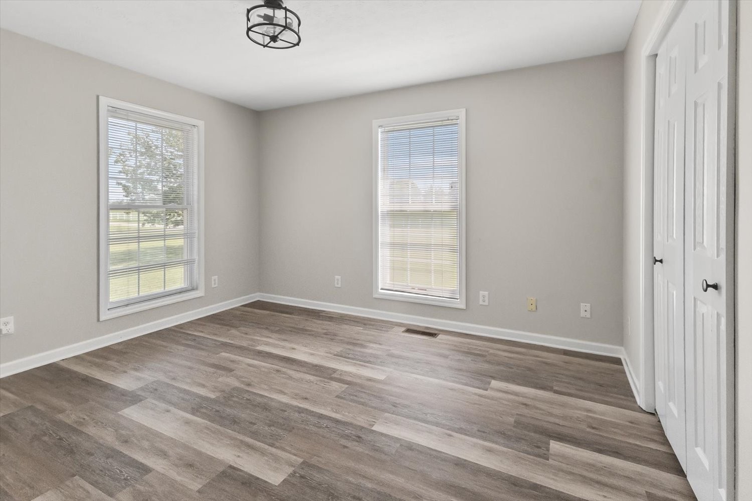 535 Darbytown Road Hohenwald, TN 38462 - Photo 25 of 45 a view of empty room with wooden floor and fan
