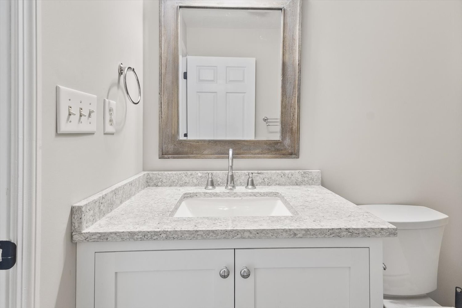 535 Darbytown Road Hohenwald, TN 38462 - Photo 26 of 45 a bathroom with a granite countertop sink and a mirror