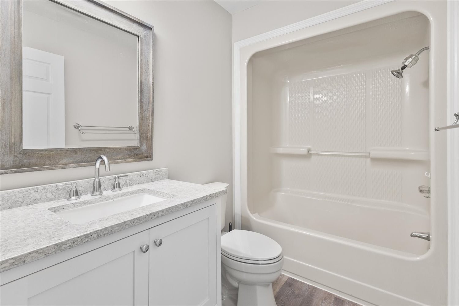 535 Darbytown Road Hohenwald, TN 38462 - Photo 27 of 45 a bathroom with a granite countertop sink toilet and shower