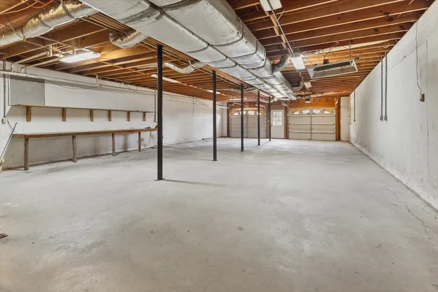 a view of empty room with windows