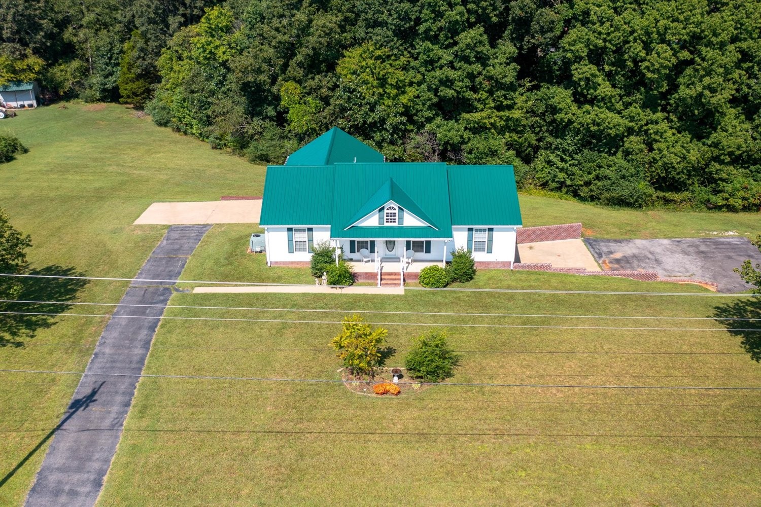 535 Darbytown Road Hohenwald, TN 38462 - Photo 43 of 45 a view of an outdoor space pool patio and lake view