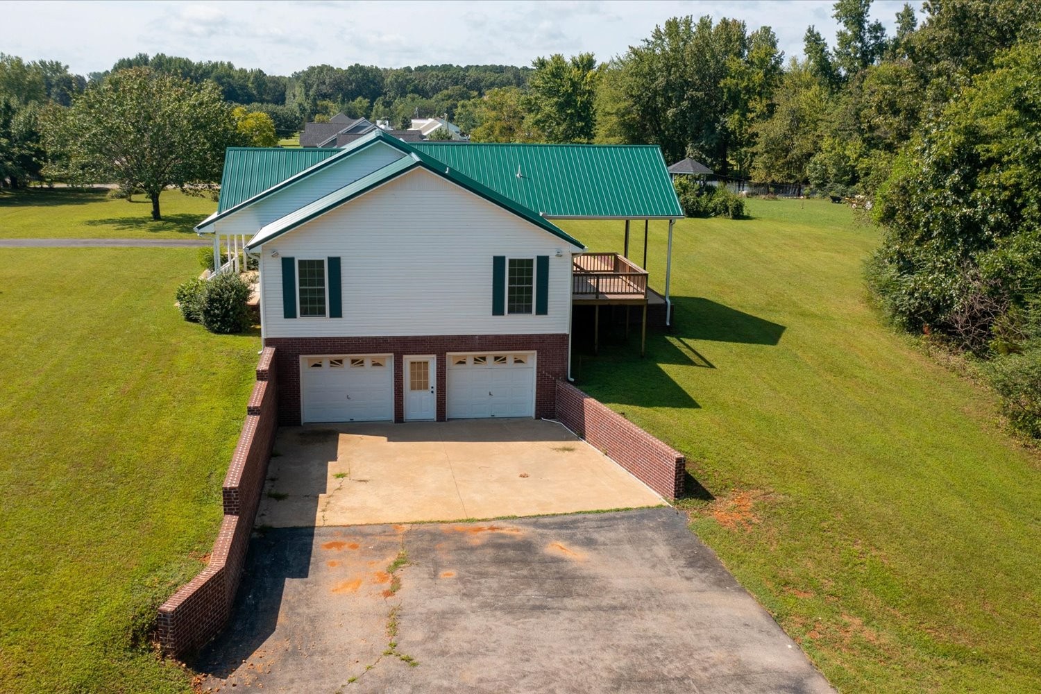 535 Darbytown Road Hohenwald, TN 38462 - Photo 10 of 45 a view of house with swimming pool