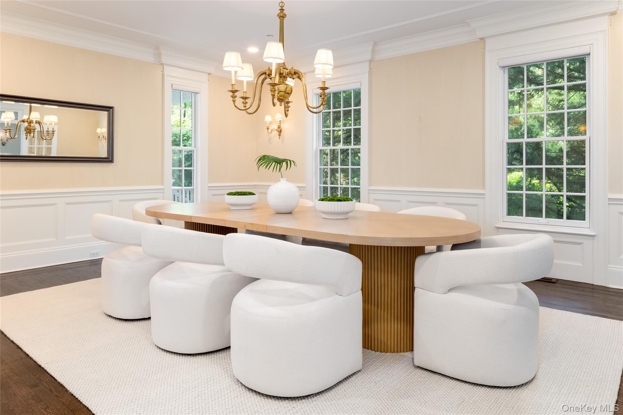 21 Dorann Road Purchase, NY 10577 - Photo 13 of 39 a living room with kitchen island furniture and a chandelier