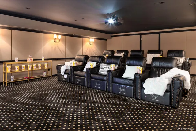 a living room with lots of chairs and a table